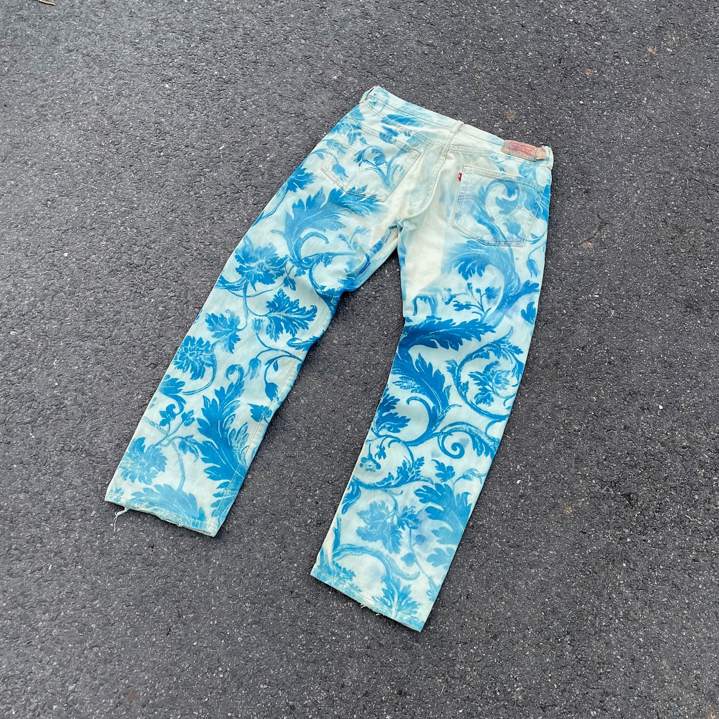 Custom Levi’s Flora Pants – Faded Botanical Art in Soft Red | Vintage Denim 1 of 1