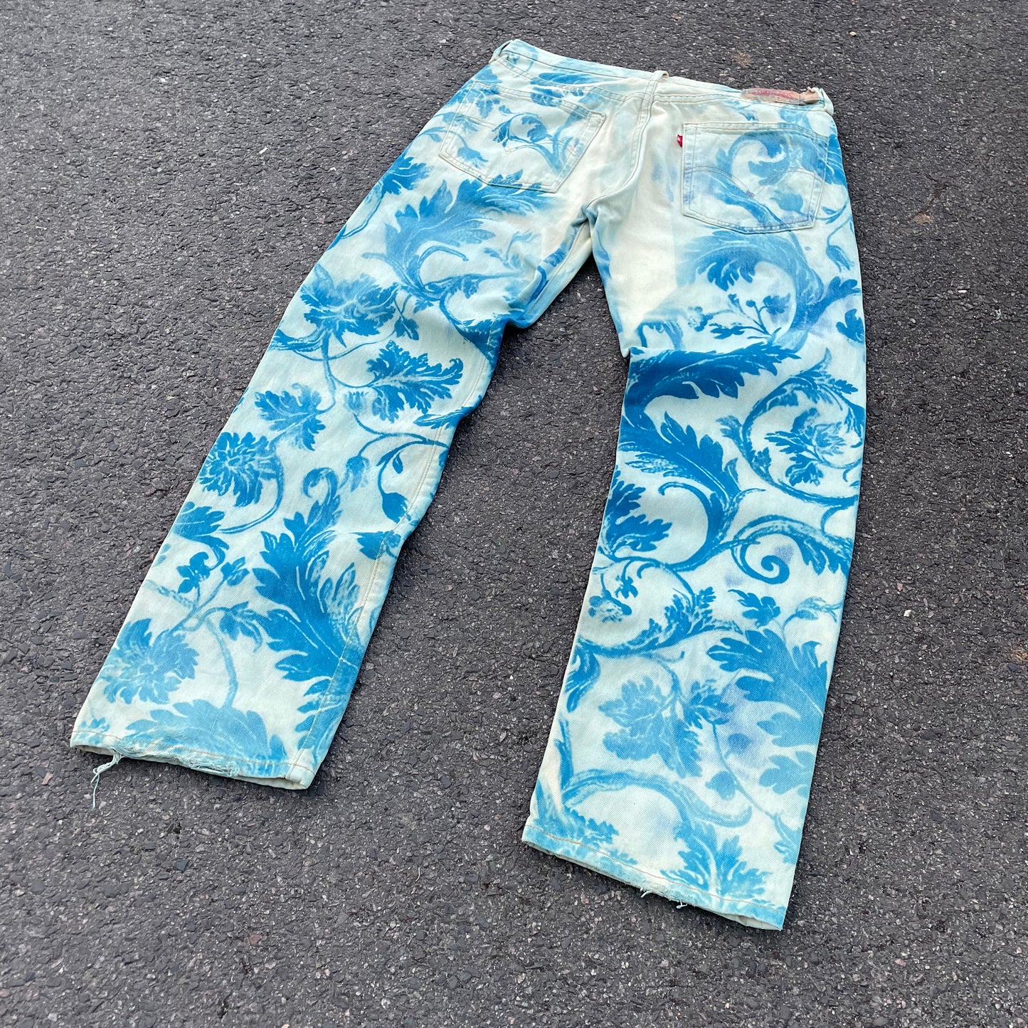Custom Levi’s Flora Pants – Faded Botanical Art in Soft Red | Vintage Denim 1 of 1