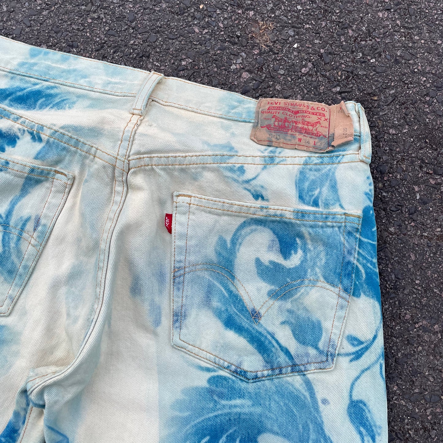 Custom Levi’s Flora Pants – Faded Botanical Art in Soft Red | Vintage Denim 1 of 1