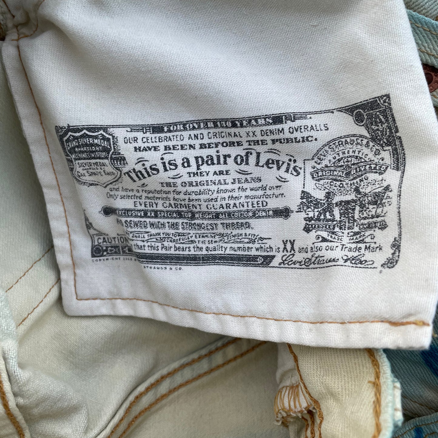 Custom Levi’s Flora Pants – Faded Botanical Art in Soft Red | Vintage Denim 1 of 1