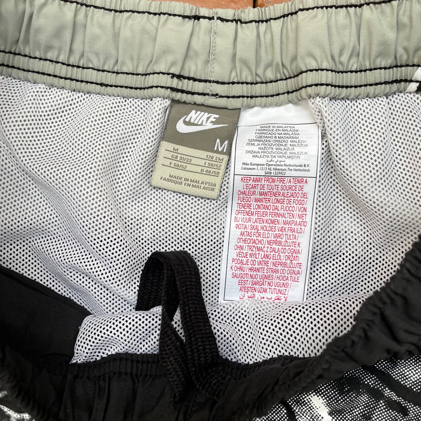 Custom Nike Grunge Shorts – Handprinted Bone Art | Vintage Sportswear 1 of 1