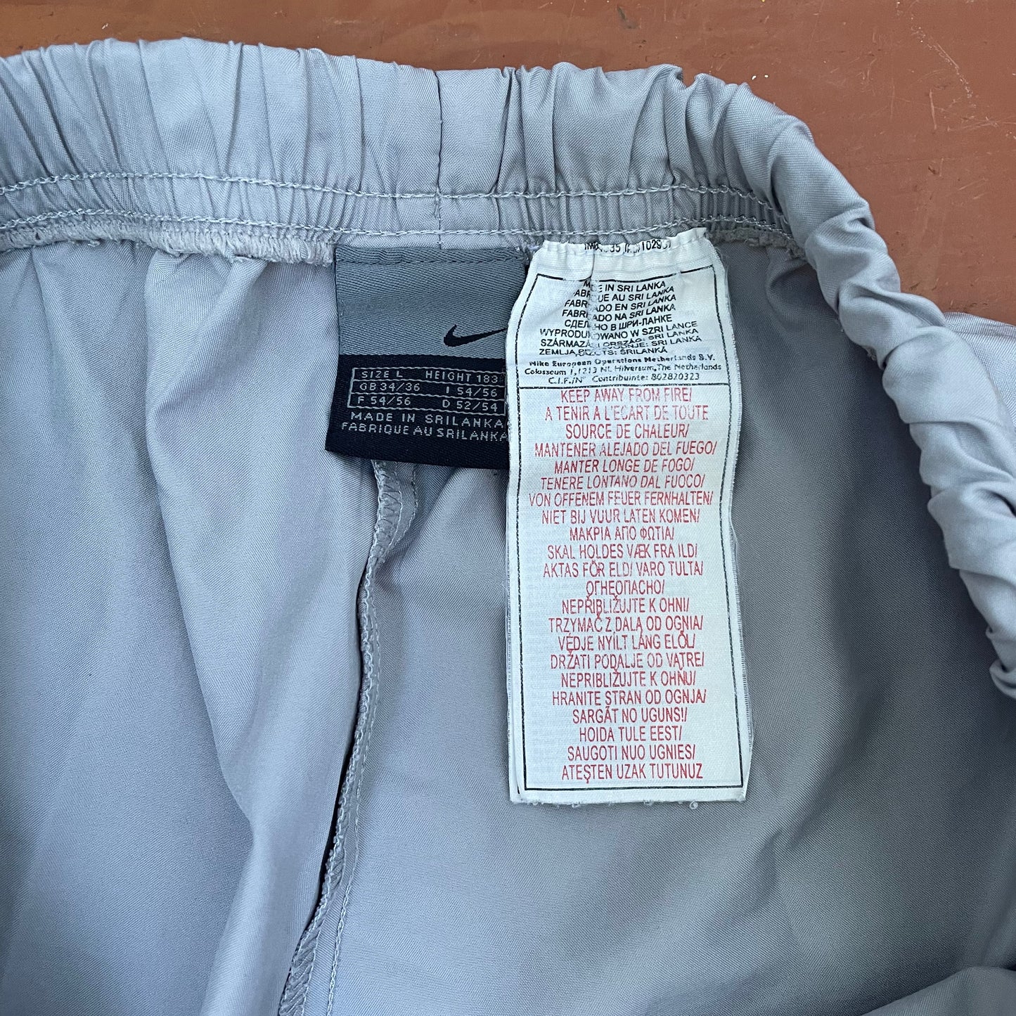 Custom Nike Tech Pants – Black Grunge Root Print | Vintage Streetwear 1 of 1