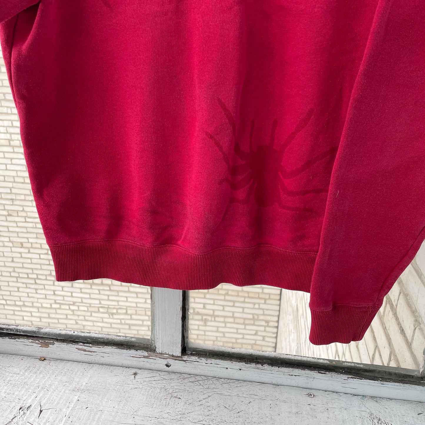 Levi’s Faded Spider Sweatshirt – Vintage Red Levi’s Crewneck with Subtle Spider Fade | 1 of 1