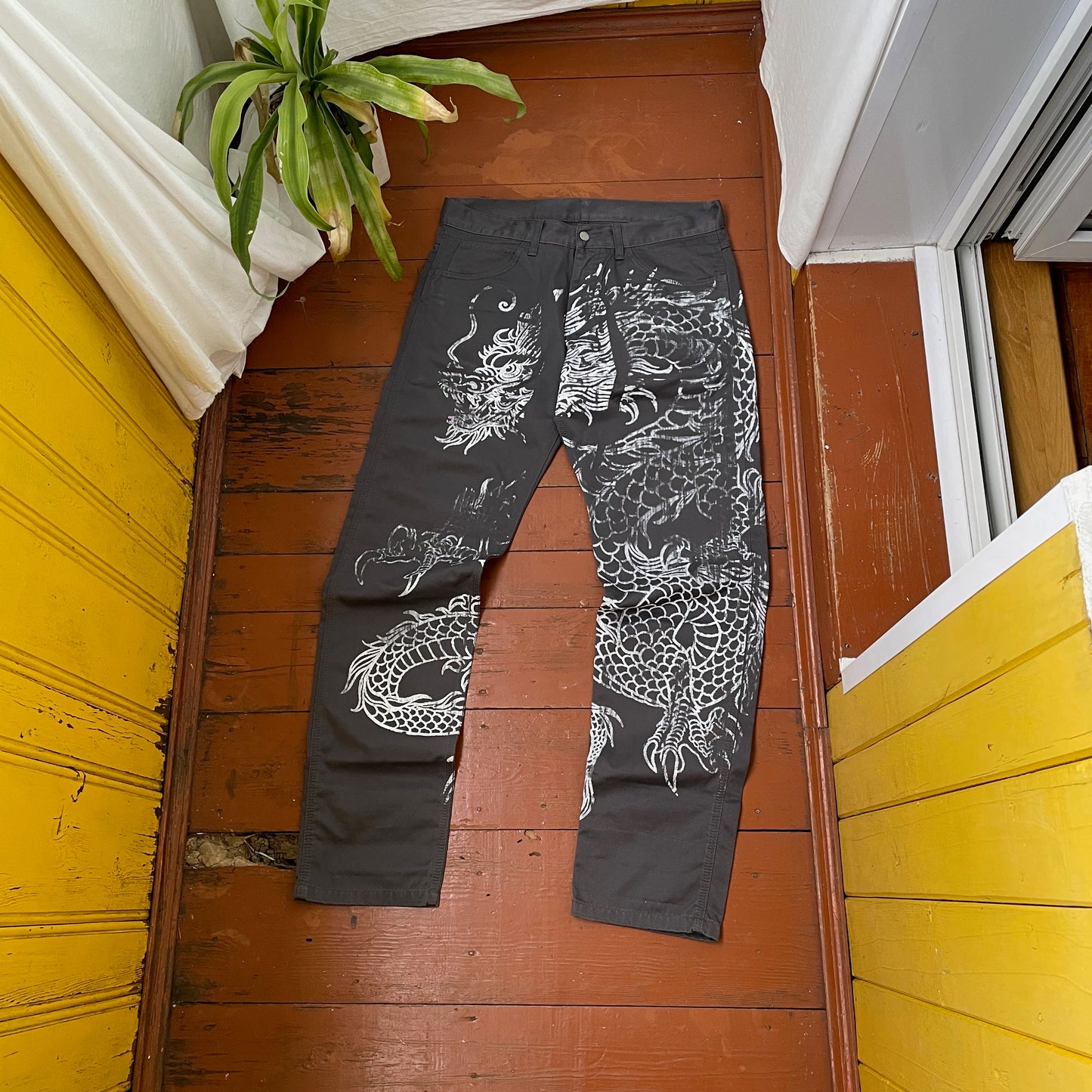 Custom Carhartt Dragon Pants – Handprinted White Dragon Art on Faded Black Canvas | Vintage Workwear 1 of 1