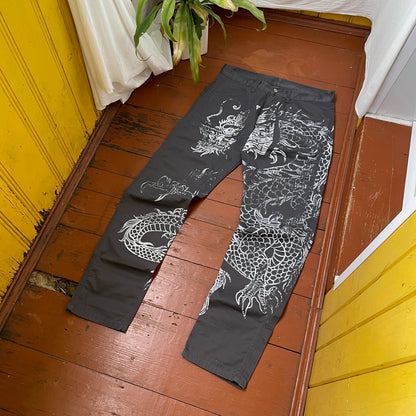 Custom Carhartt Dragon Pants – Handprinted White Dragon Art on Faded Black Canvas | Vintage Workwear 1 of 1