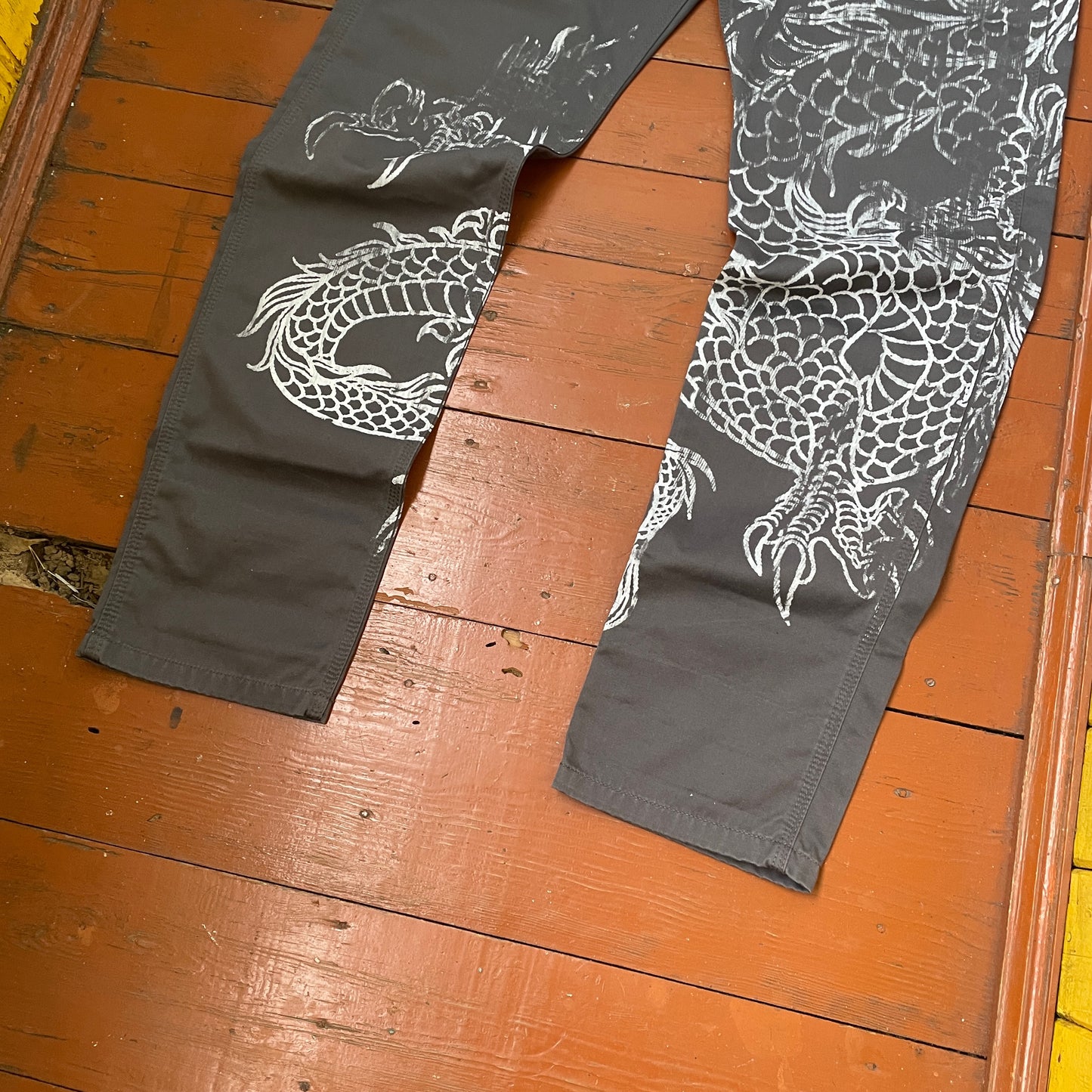 Custom Carhartt Dragon Pants – Handprinted White Dragon Art on Faded Black Canvas | Vintage Workwear 1 of 1