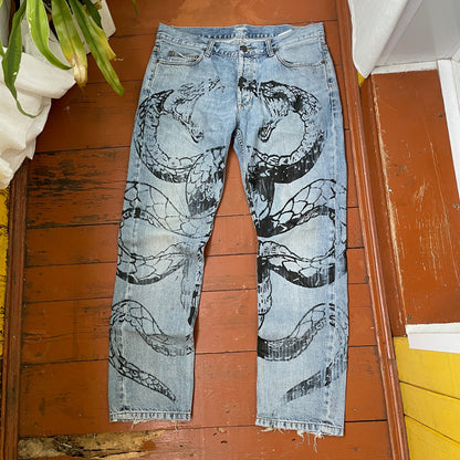 Custom Carhartt Snake Jeans – Handprinted Black Snake Art on Faded Light Wash Denim | 1 of 1 Reworked Pants