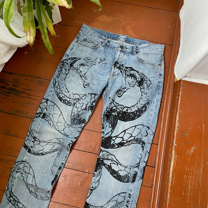 Custom Carhartt Snake Jeans – Handprinted Black Snake Art on Faded Light Wash Denim | 1 of 1 Reworked Pants