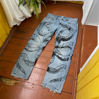 Custom Carhartt Snake Jeans – Handprinted Black Snake Art on Faded Light Wash Denim | 1 of 1 Reworked Pants