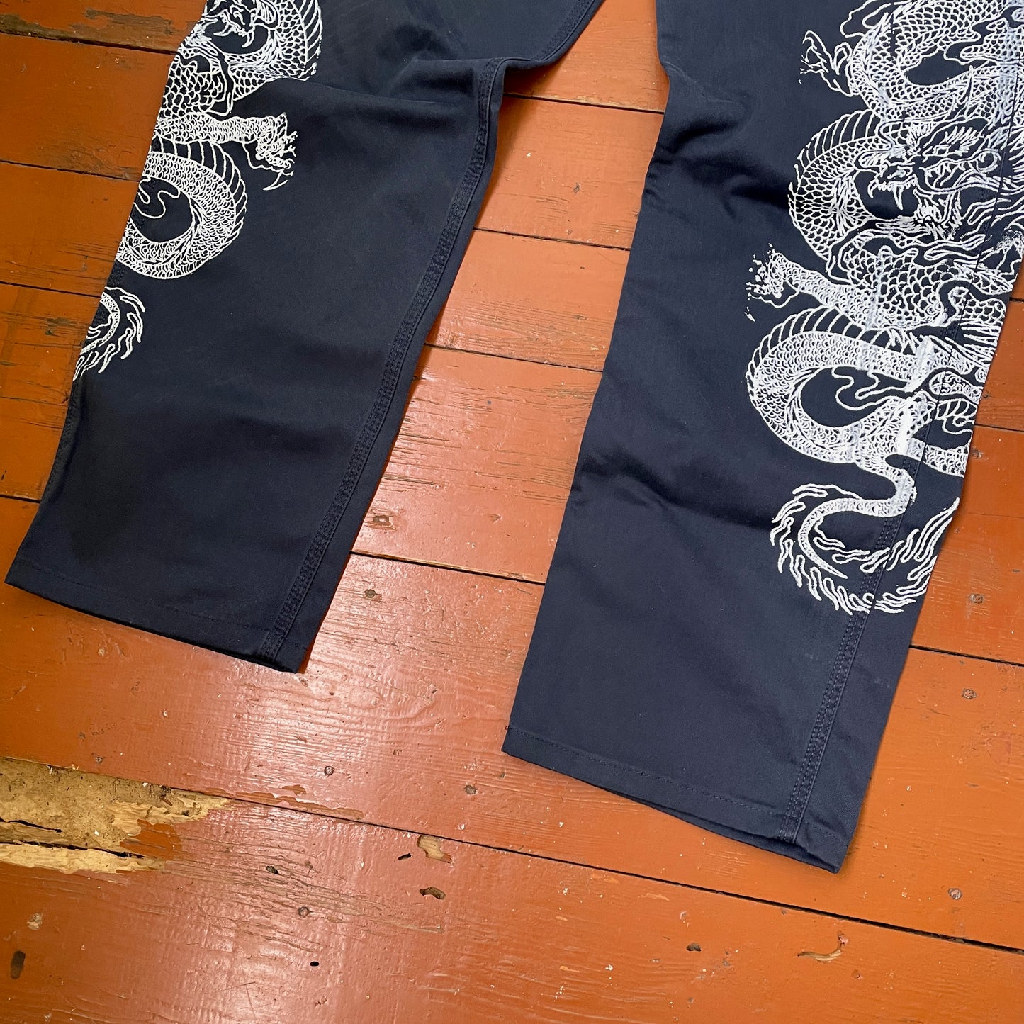 Custom Carhartt Dragon Pants – Navy Blue Workwear with Twin White Dragon Print | 1 of 1 Reworked Streetwear