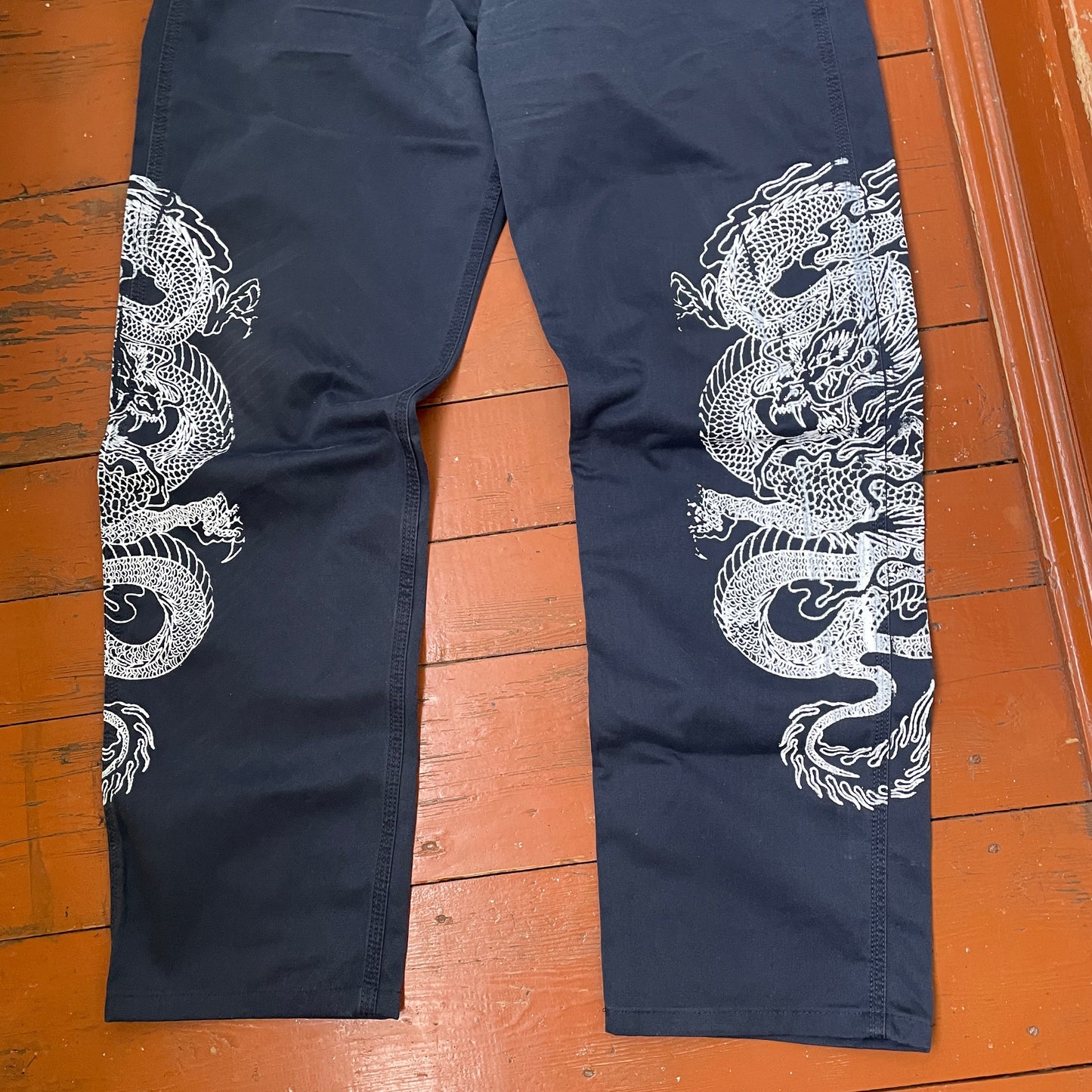 Custom Carhartt Dragon Pants – Navy Blue Workwear with Twin White Dragon Print | 1 of 1 Reworked Streetwear